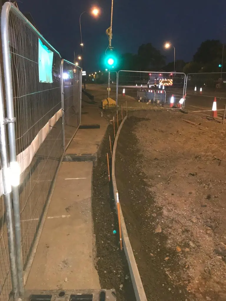 Highway works continuing after dark under temporary traffic signals